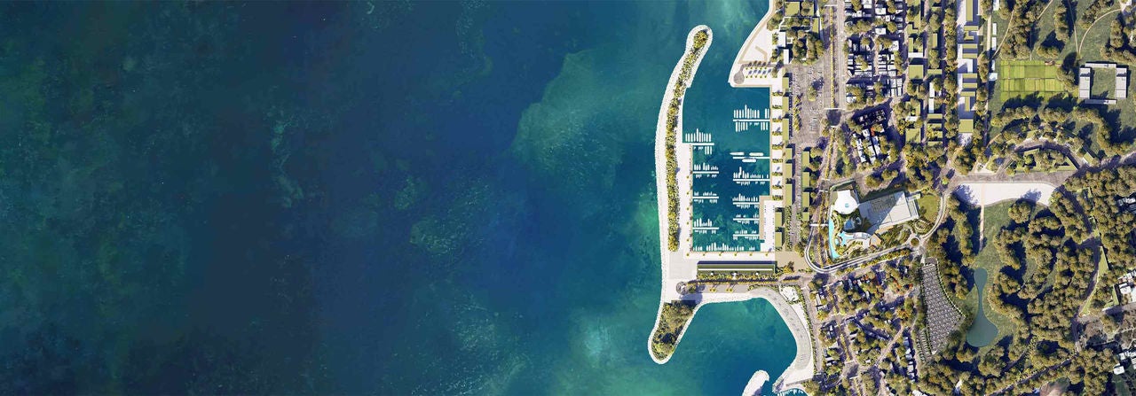 Aerial view of coastal marina and town